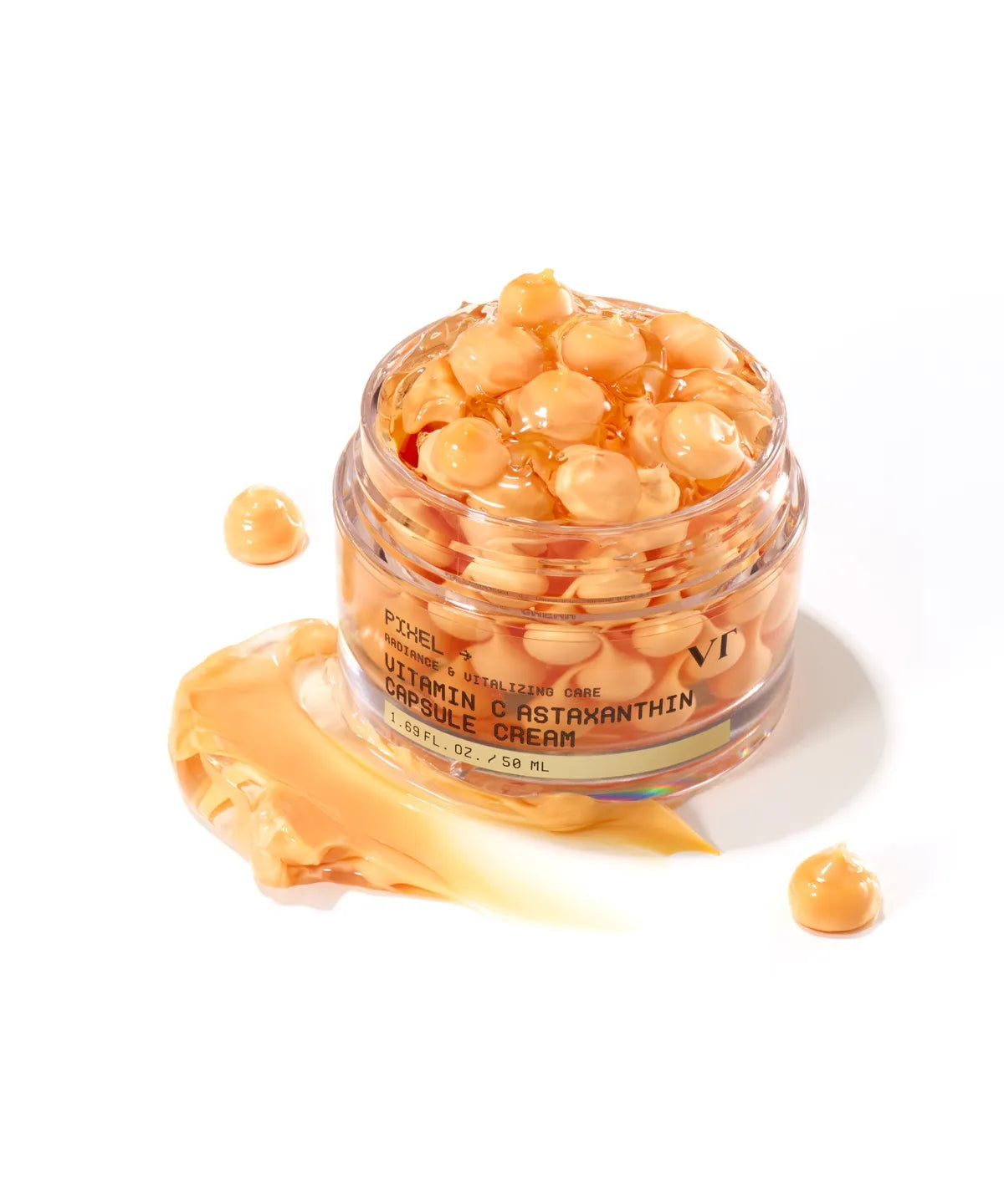 VT COSMETIC Vitamin C Astaxanthin Capsule Cream 50ml, pot et capsule crème orange sur fond clair, marque VT COSMETIC.