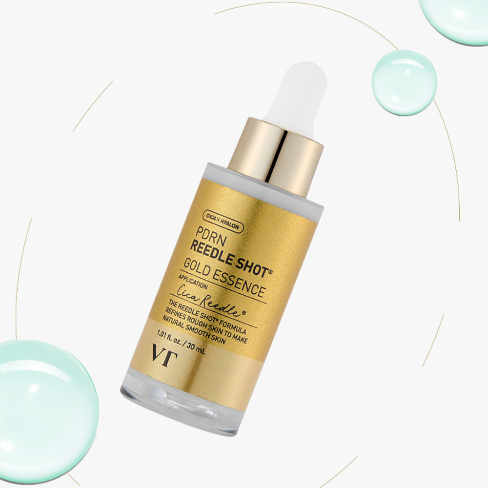 Décris l'image en français : VT COSMETICS  PDRN Riddle Shot Gold Essence 30ml, flacon doré VT sur fond clair décoré.