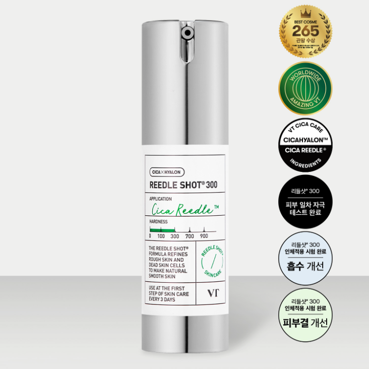 VT COSMETICS Riddle Shot 300 50ml de VT COSMETIC, flacon blanc sur fond clair, étiquettes promotionnelles en cercle.