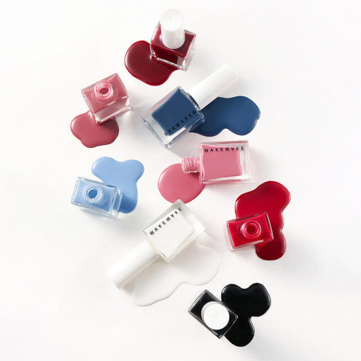 WAKEMAKE Nail Gun (#08 to #167) : pistolet à clous marque WAKEMAKE sur fond blanc, vue d’accessoires colorés.
