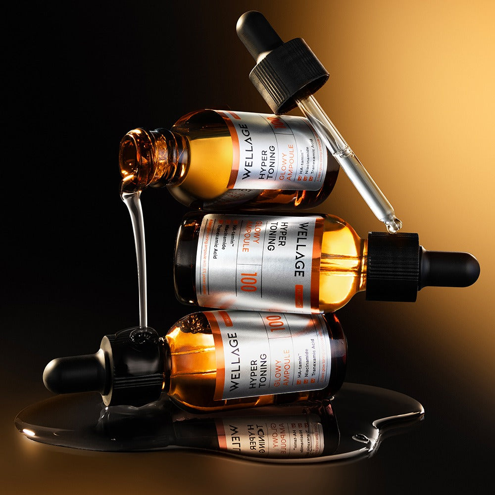 WELLAGE Hyper Toning Glow Ampoule 30ml de la marque WELLAGE, flacons d’ampoules sur fond noir et beige, ambiance luxe