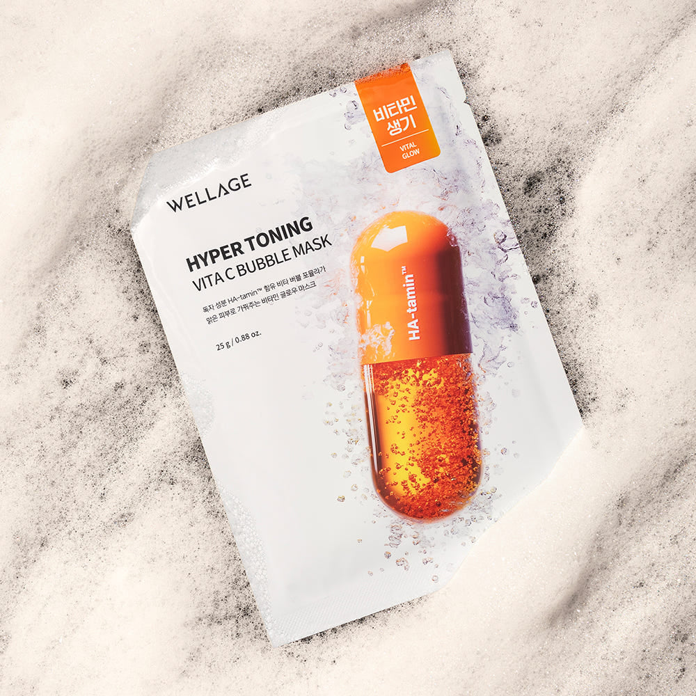WELLAGE  Hyper Toning Vita C Bubble Mask 25gx5 sheets : masque visage en feuille sur fond marbre, sachet blanc avec bulles orange.