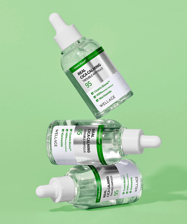 WELLAGE Real Cica Calming 95 Trouble Ampoule 50ml, sérum apaisant, marque WELLAGE, flacons verts sur fond vert clair.
