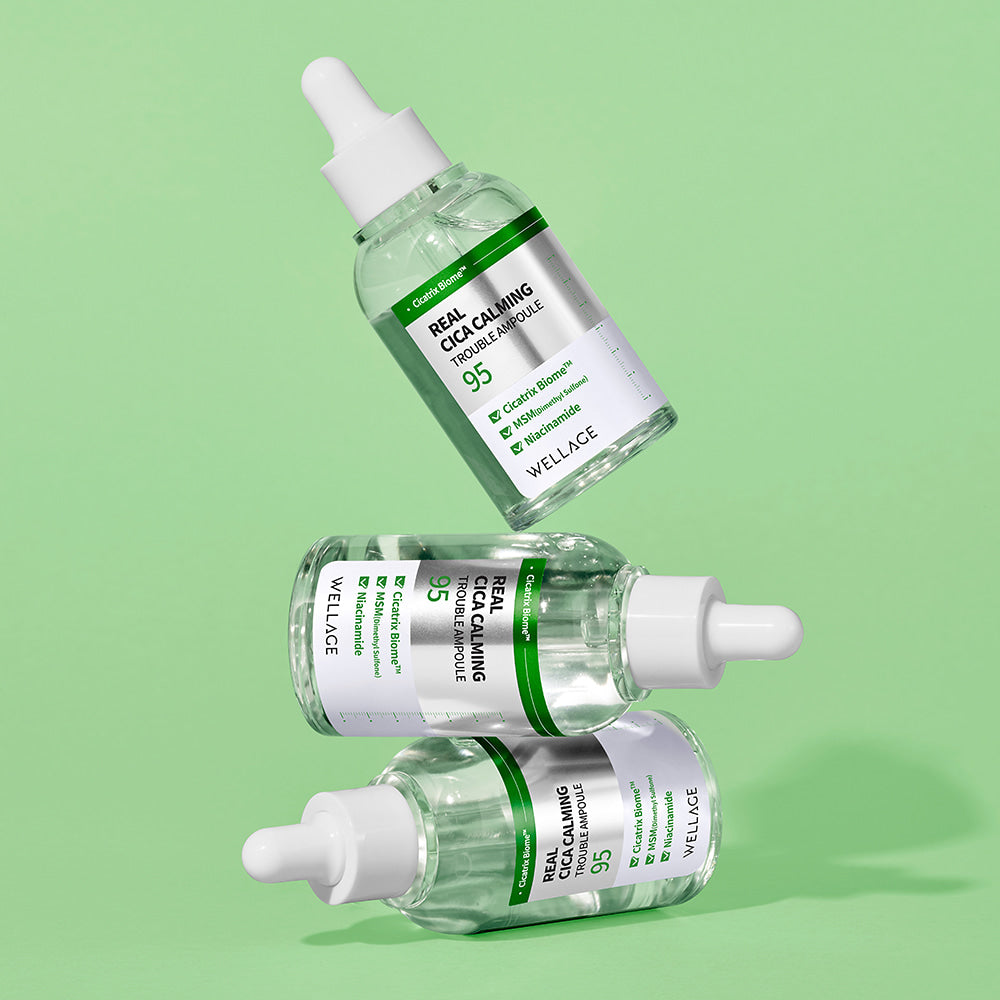 WELLAGE Real Cica Calming 95 Trouble Ampoule 50ml, sérum apaisant, marque WELLAGE, flacons verts sur fond vert clair.