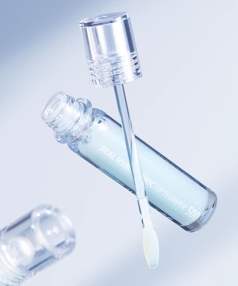 WELLAGE  Real Hyaluronic Lip Plumper 3.8ml, flacon transparent sur fond bleu, gouttes et applicateur pour lèvres pulpeuses.