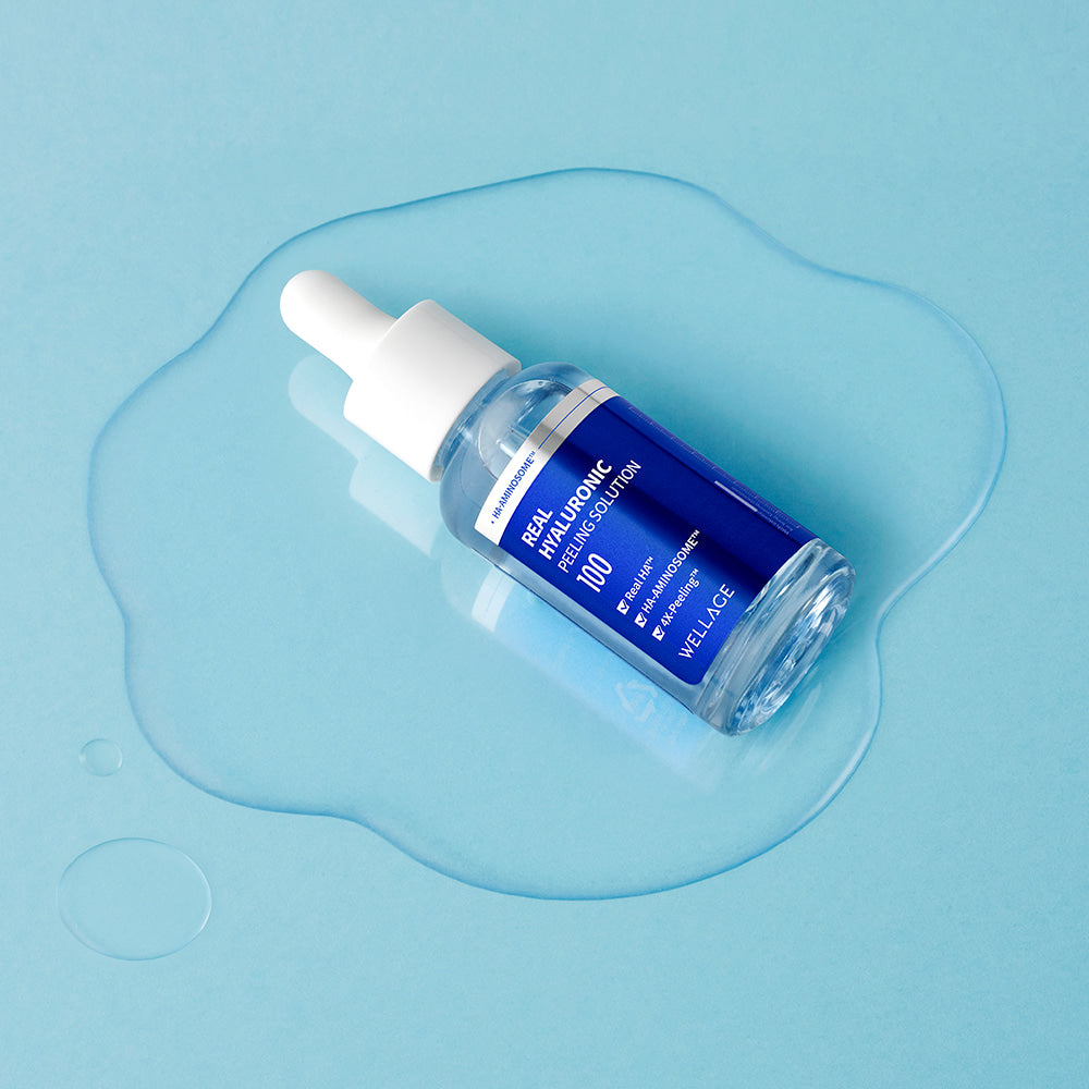 WELLAGE Real Hyaluronic Peeling Solution 30ml de la marque WELLAGE, flacon sur fond bleu, gel visuel.