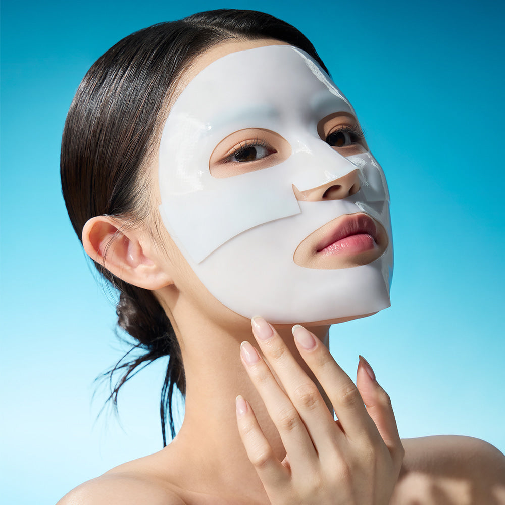WELLAGE Real hyaluronic Glow Booster PDRN Mask 5 Sheets, masque visage hydratant WELLAGE sur peau, fond bleu
