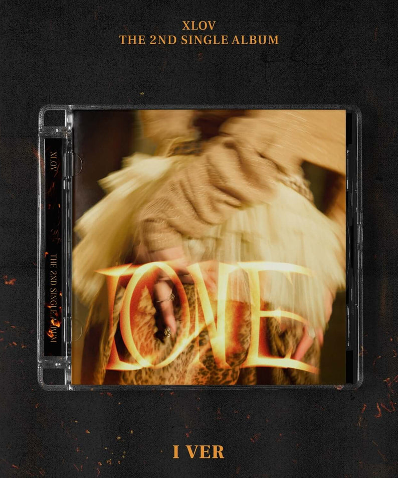 XLOV - 2nd Single [I ONE] (I VER.) - Album Kpop : pochette noire avec visuel doré, disque en boîtier, marque XLOV.