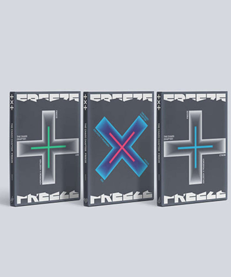 TXT - [ : FREEZE] (3) - Album Kpop : jaquettes noir/bleu “FREEZE” avec croix, photo produit sur fond clair.