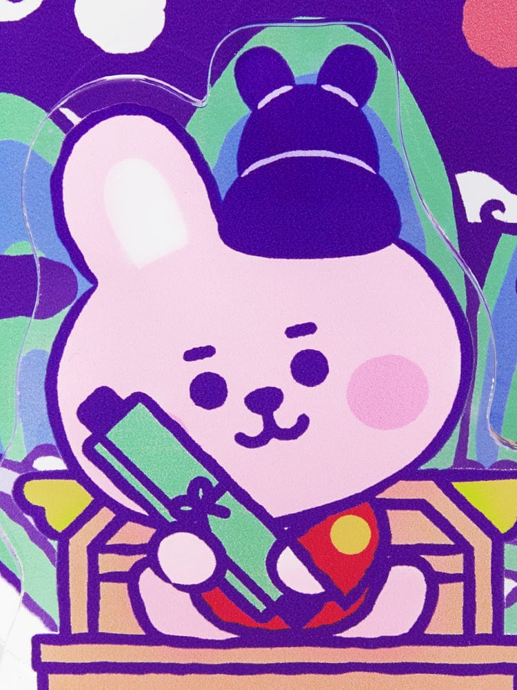 BT21 COOKY BABY ACRYLIC STAND K-EDITION ver.2, LINE FRIENDS : illustration COOKY tenant un livre, fond coloré violet