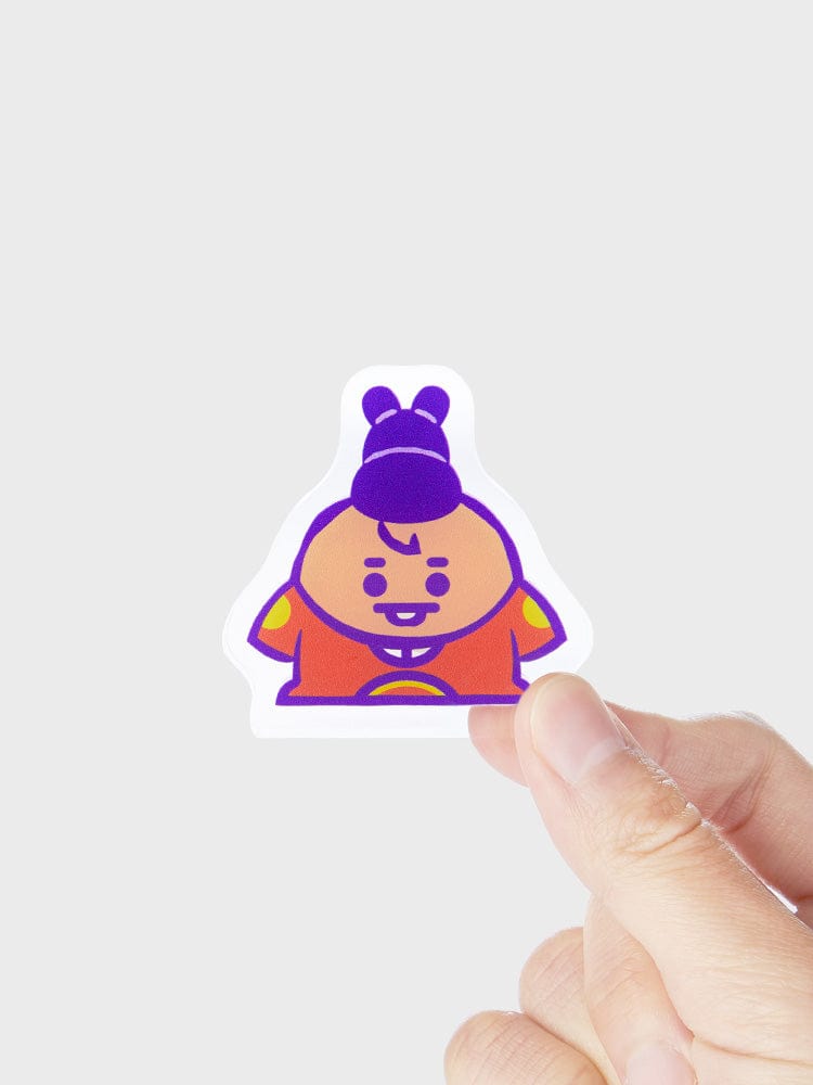 BT21 SHOOKY BABY MINI ACRYLIC STAND K-EDITION ver.2 : figurine transparente SHOOKY, main tenant la papeterie LINE FRIENDS, fond clair.